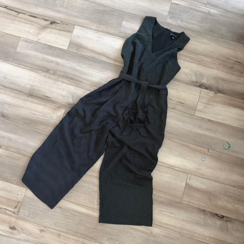 Banana Republic black with white polka dot romper in a size 12